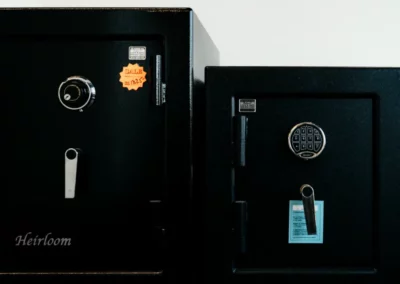 Safes with different locking mechanisms