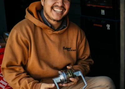 A worker inspects a lock