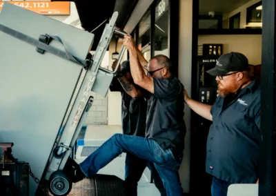 The Balport team loads a truck