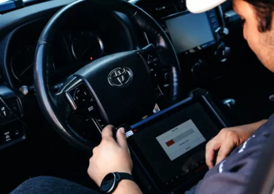 A Balport worker checks his tablet