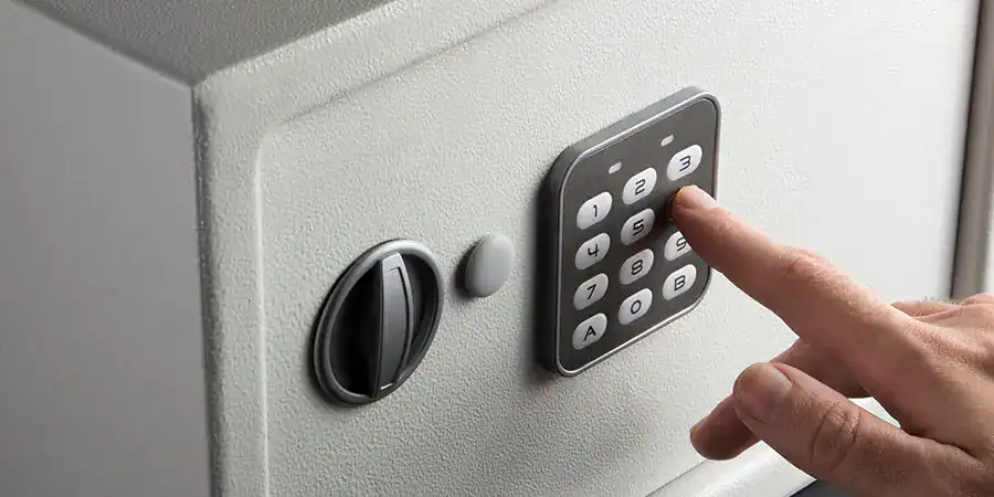A man opens a safe