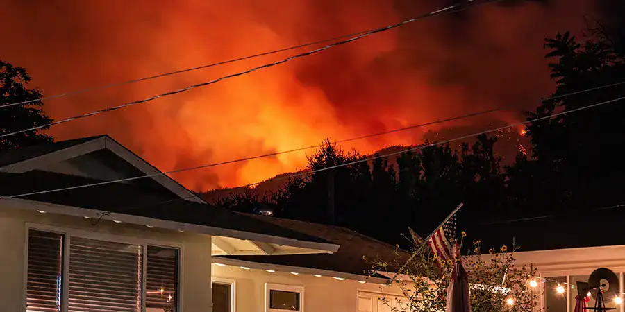 A California home threatened by wildfire